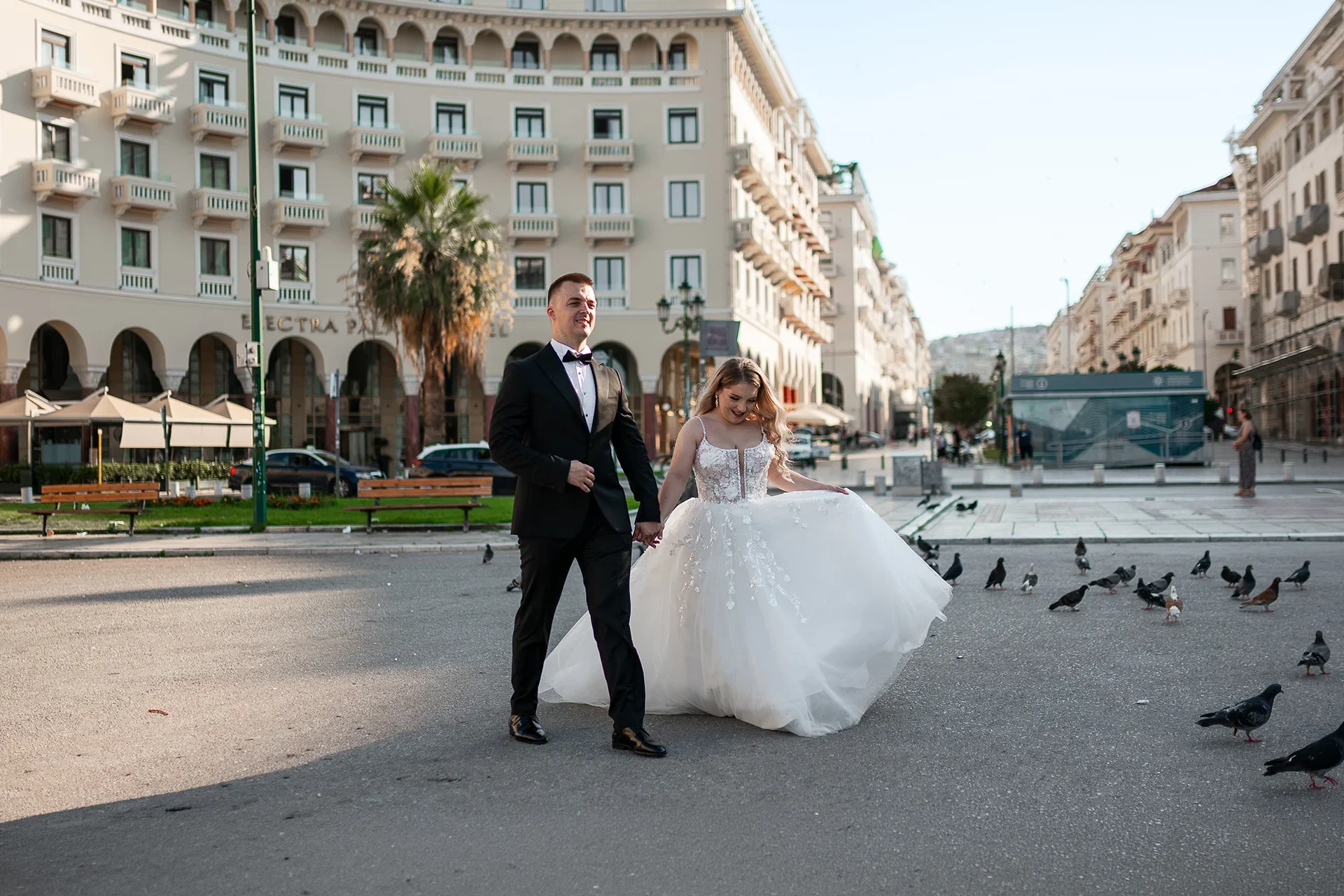 Wedding couple walking in the center of Thessaloniki – destination wedding photography